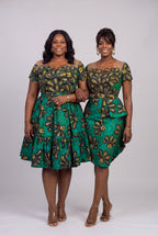 Plus size model in the Teal Flora African print skater dress standing with a regular model in the Teal Flora Ankara peplum dress