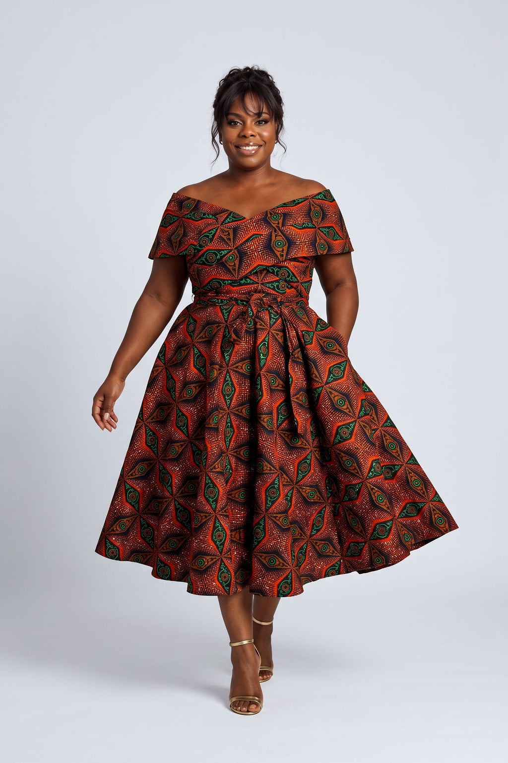 Model walking in Copper Star Ankara dress with deep pockets