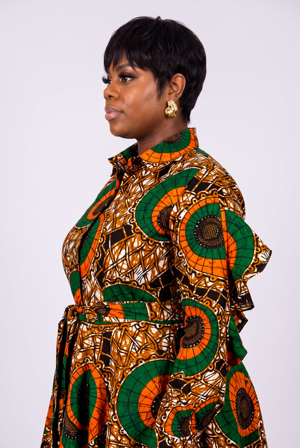 Close up of Bronze Sun shirt collar and ruffle sleeve detail