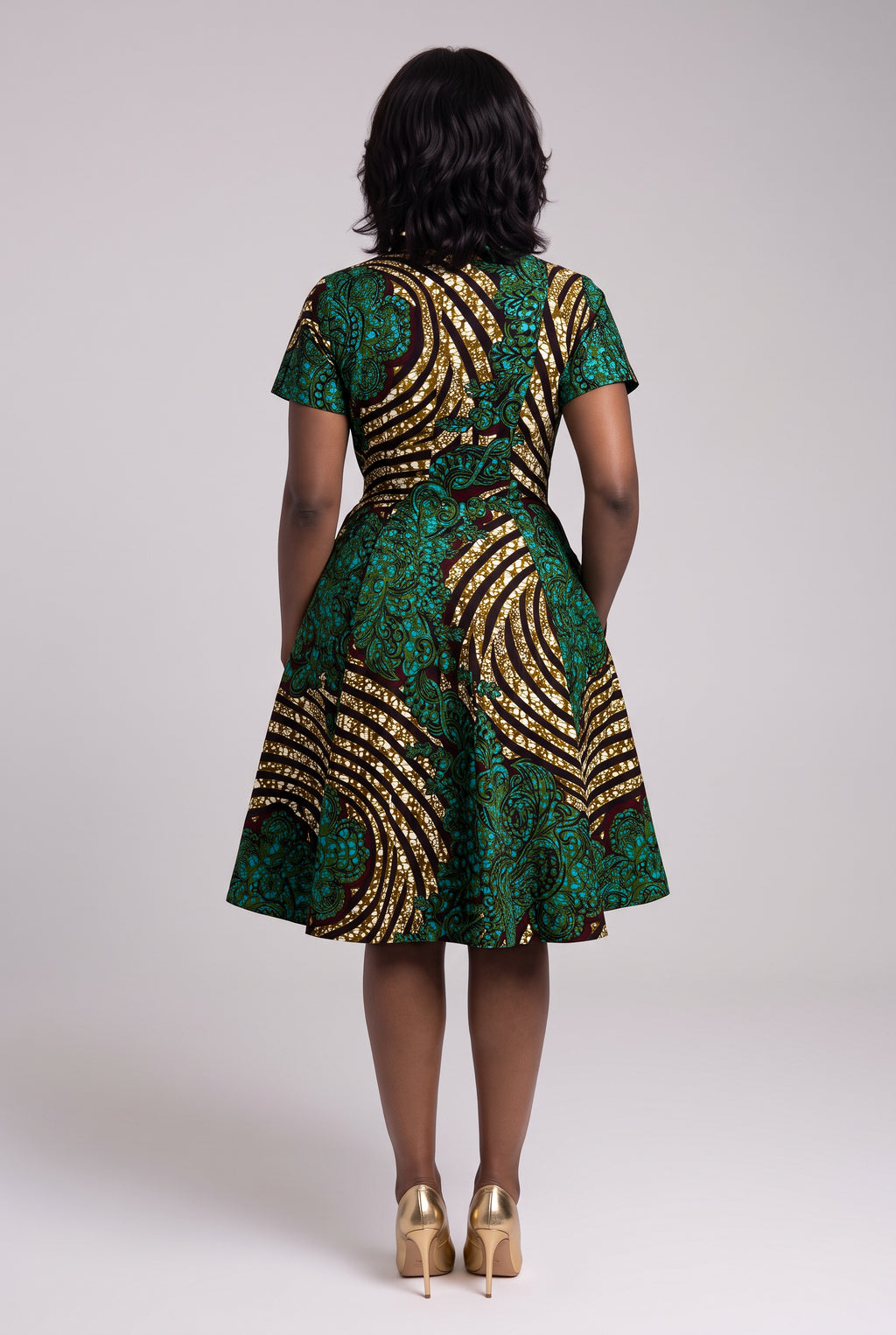 Back view of green African wrap dress in Ankara wax print