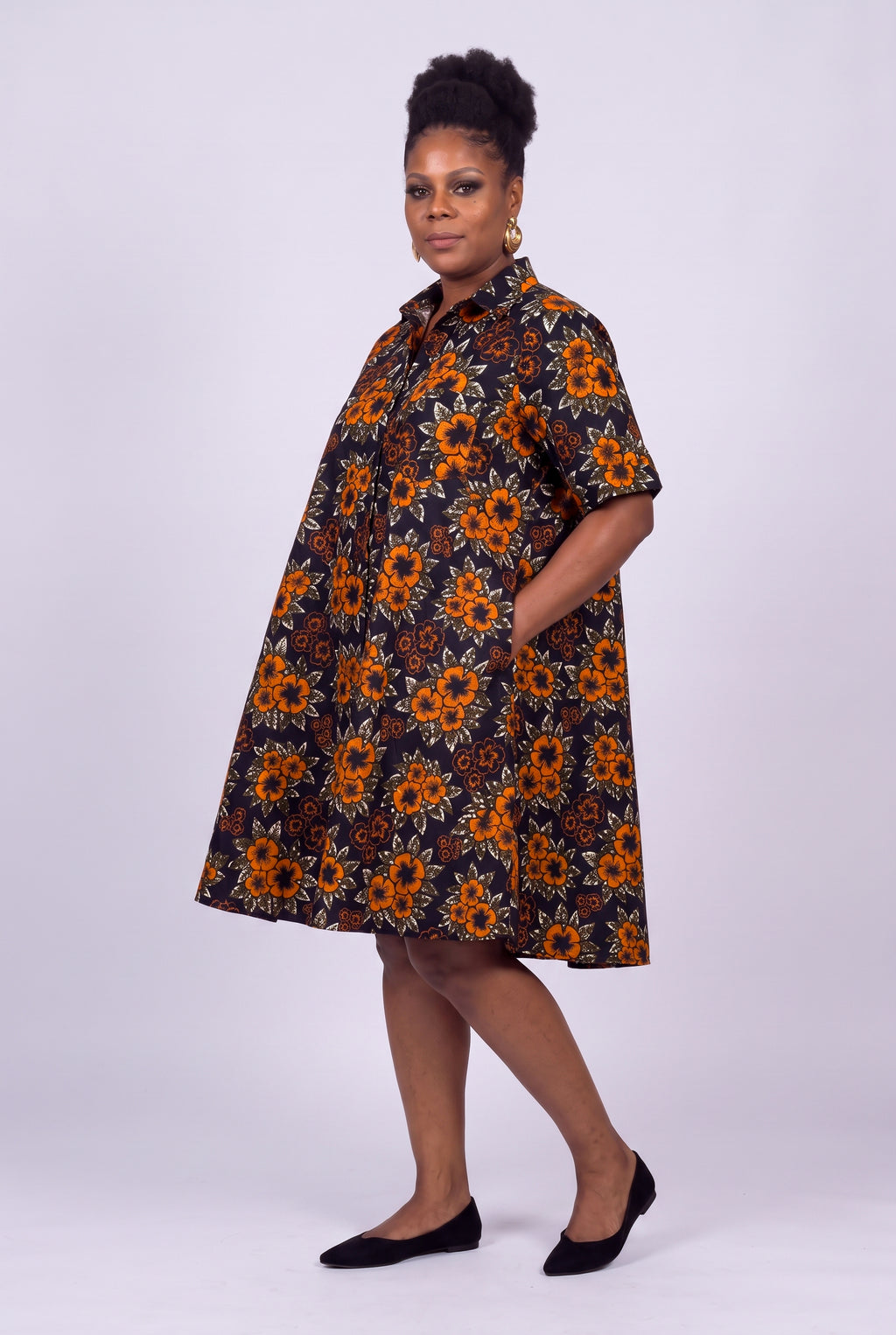 Three quarter view of Amber Bloom African print swing dress