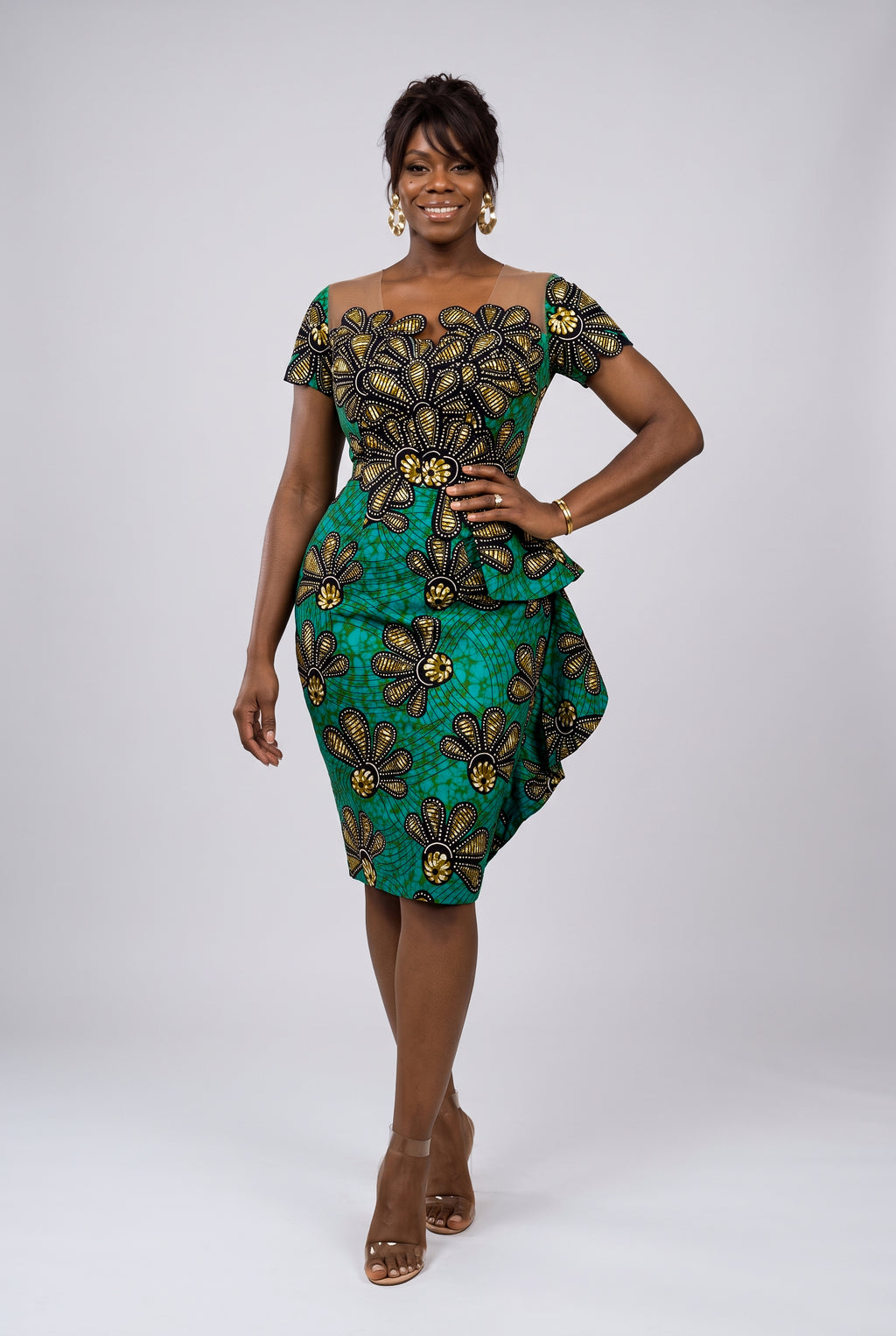Front view of Teal Flora teal African print peplum dress