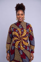 Close up font view of Burgundy Helix Ankara shirt dress with stand collar, buttons and burgundy leaf print