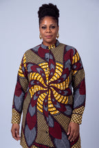 Plus size model wearing Burgundy Helix African print long sleeve shirt dress