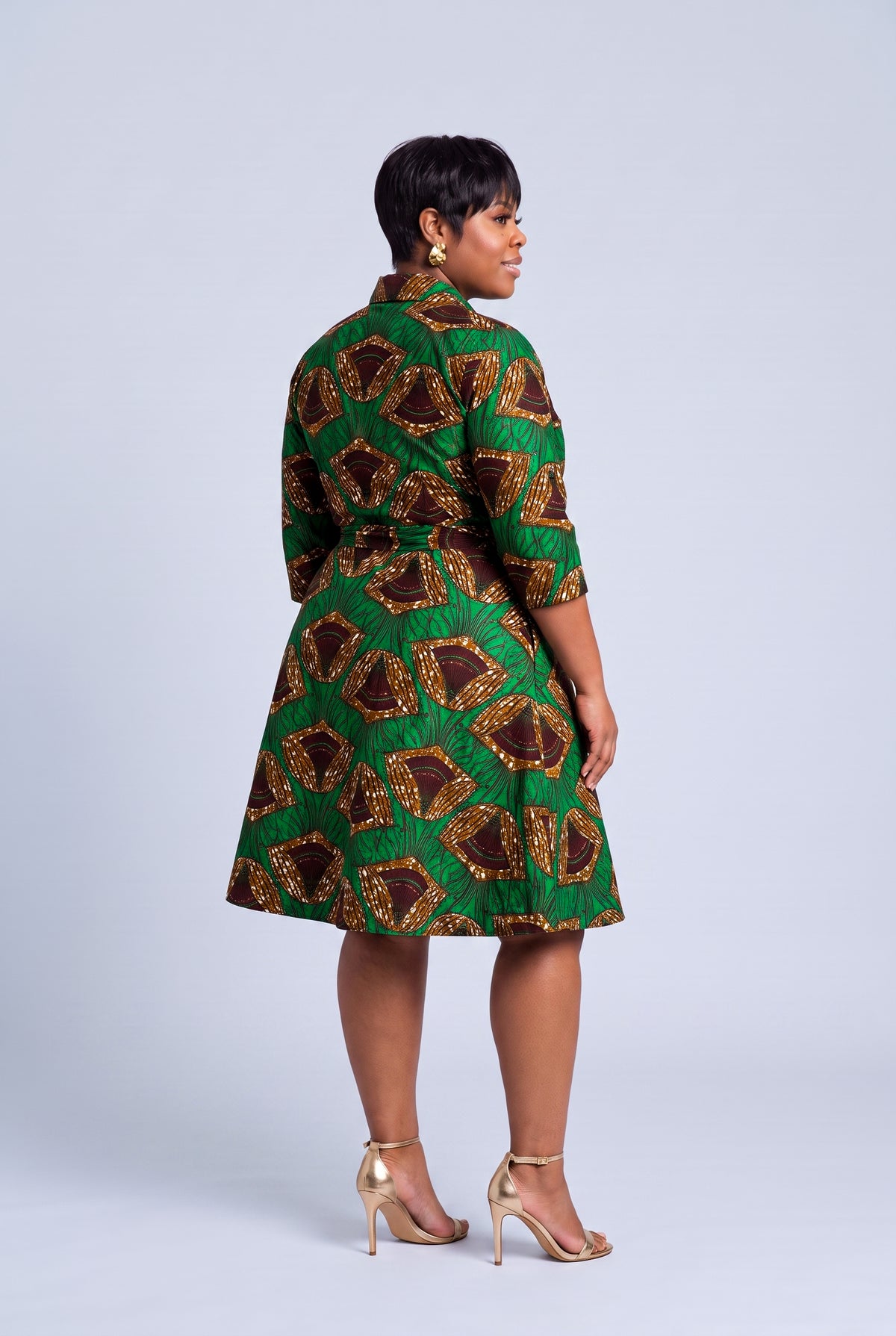 Back view of Forest Oasis green and gold African print wrap dress