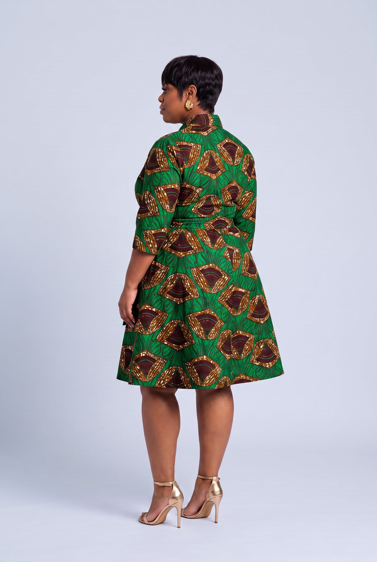 Back Full length view of Forest Oasis African print wrap midi dress with flowing skirt