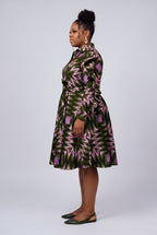 Side view of green African shirt dress showing ruffle sleeve detail