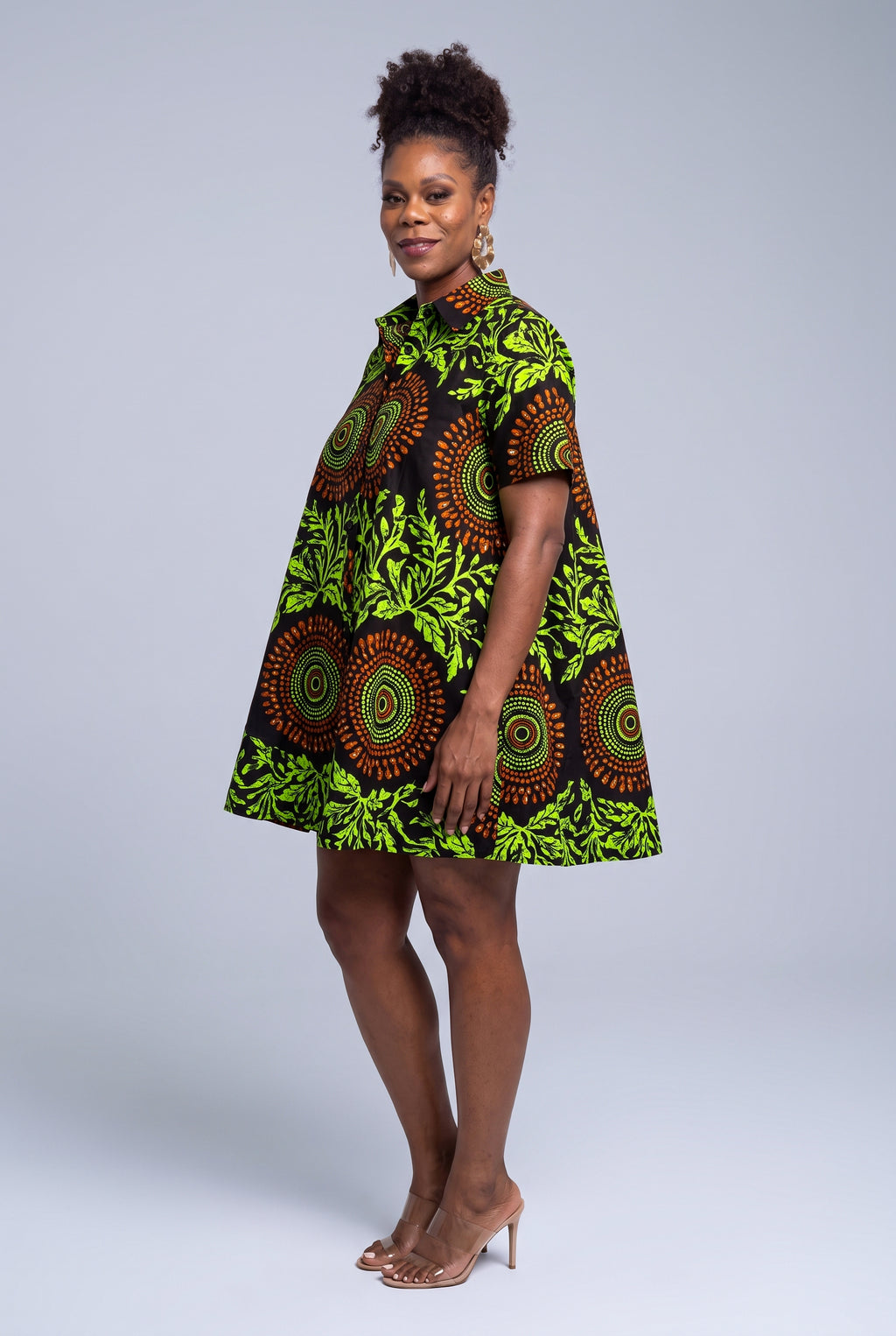 Side view of Lime Orbit African print short dress showing the loose swing silhouette