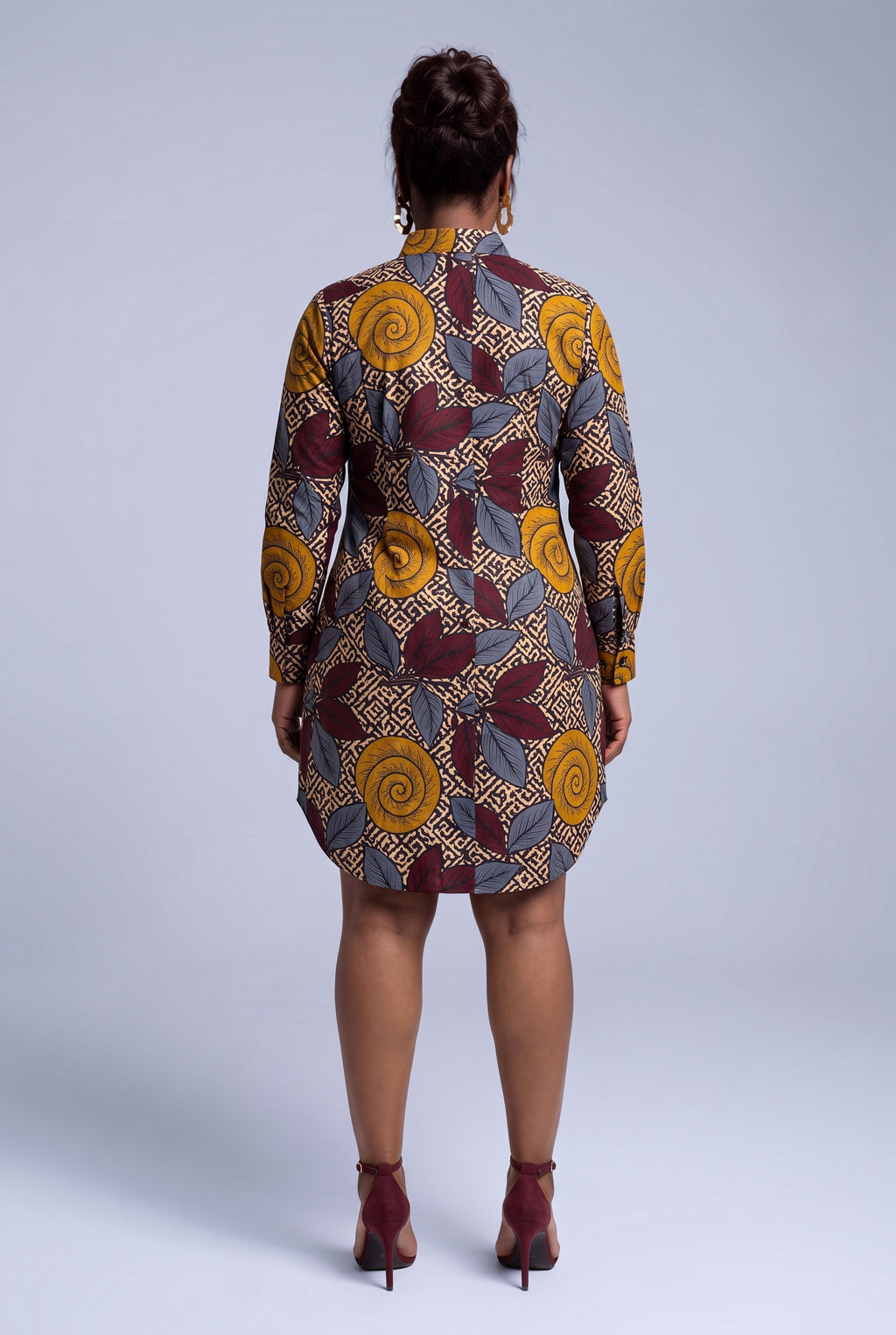  Back view of Ochre Grove African print long sleeve shirt dress with brown burgundy grey and ochre patter