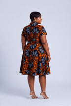 Back view of African wrap dress with tie waist detail 