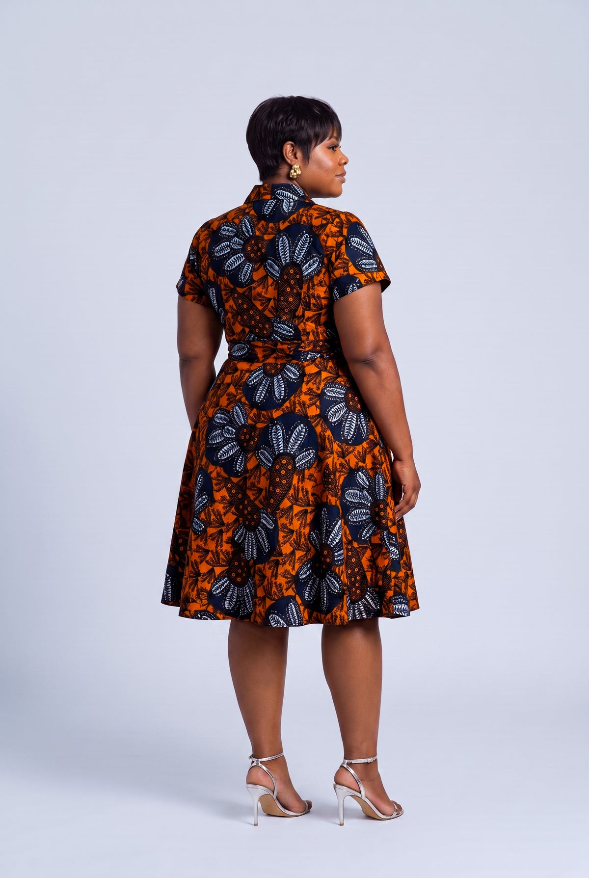 Back view of African wrap dress with tie waist detail 