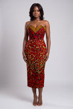 Model wearing  red  African print corset midi dress with strapless sweetheart neckline