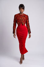 Model walking in Red Vine Ankara cropped jacket paired with a red bodycon dress