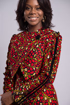 Model wearing Red Vine Ankara two piece wedding guest outfit