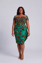 Plus size model wearing Teal Flora Ankara peplum dress