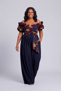 Plus size model wearing Ruby Nova navy Ankara wrap top