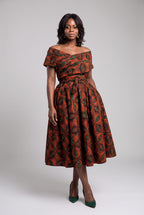 Front view of Copper Star orange African print off shoulder dress
