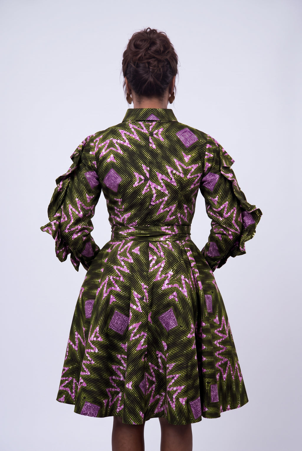 Back view angle highlighting the clean line an Ankara shirt dress