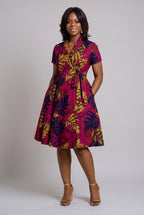 Front view of Fern Bloom pink African print wrap dress