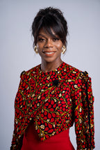 Close up of Red Vine ruffle sleeve and cropped jacket detail